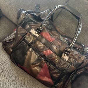 Leather patchwork duffel bag